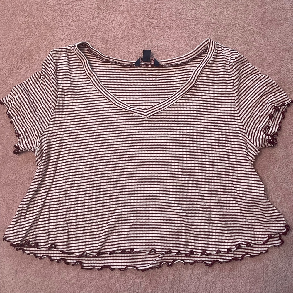Super cute v-neck crop top with ruffle detailing. So soft. Very stretchy & comfy